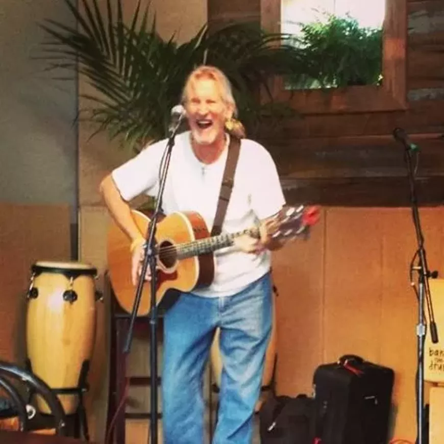 robi_duganne.laughing_bang_the_drum.webp