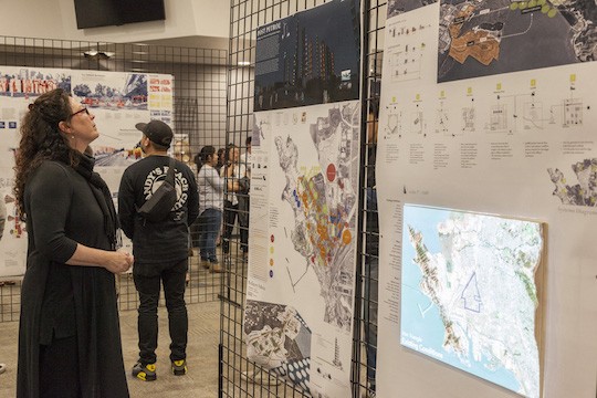 — Christy O'Hara, a faculty member in Cal Poly’s Landscape Architecture Department, reviews the work of the Winter Quarter 2019 Fifth-Year Landscape Architecture Showcase.