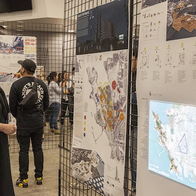 — Christy O'Hara, a faculty member in Cal Poly’s Landscape Architecture Department, reviews the work of the Winter Quarter 2019 Fifth-Year Landscape Architecture Showcase.