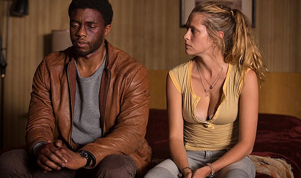 ALL HAIL THE KING While searching for his missing sister in LA, South African Jacob King (Chadwick Boseman) meets Kelly (Teresa Palmer), a down-on-her-luck single mom who helps him as much as he helps her, in Message from the King, currently screening on Netflix. - PHOTO COURTESY OF BACKUP MEDIA