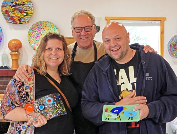 ART MENTOR Marie Bolin (left) and Charles Bolin (right) show off their glass work after a September 2019 Veterans Voices fused glass workshop led by Larry Le Brane (center). - COURTESY PHOTO BY CARLOTA SANTA CRUZ
