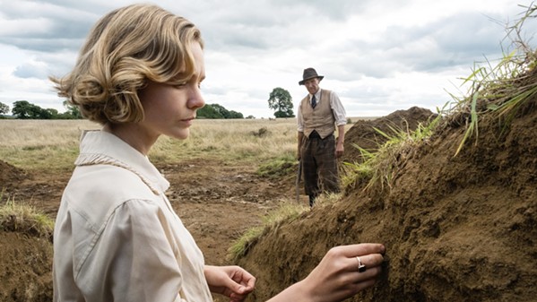 PARTNERS Suffolk landowner Edith Pretty (Carey Mulligan) hires self-described excavator Basil Brown (Ralph Fiennes) for an archaeological dig of what appears to be burial mounds on her property, leading to a remarkable discovery, in Netflix's The Dig, based on real events. - PHOTO COURTESY OF MAGNOLIA MAE FILMS