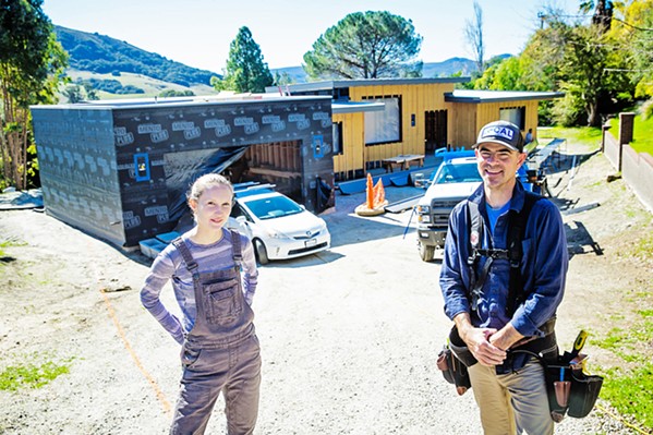 WITH EFFICIENCY IN MIND Michael Horgan (right) and Hannah McKay (left) collaborate to build the first passive house in San Luis Obispo. - PHOTO BY JAYSON MELLOM