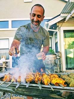 GRILL MAN Sina Shakerian and his wife, Lindsey Shakerian, started Shekamoo Grill in 2020 as a pop-up restaurant to share Persian food with North SLO County. - PHOTOS COURTESY OF SINA SHAKERIAN