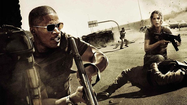 STRANGERS IN A STRANGE LAND American FBI Agents Ronald Fleury (Jamie Foxx) and Janet Mayes (Jennifer Garner) race against time to find a terrorist cell responsible for an attack on a U.S. military base in Saudi Arabia, in The Kingdom, screening on HBO Max. - PHOTO COURTESY OF UNIVERSAL PICTURES