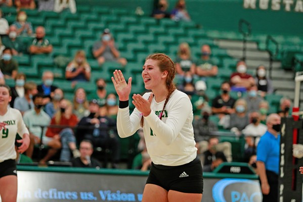 LEADING THE CHARGE Volleyball team co-captain Meredith Phillips led her team to win two of five sets at their first home game in more than 600 days on Sept. 1. - PHOTOS COURTESY OF CAL POLY ATHLETICS COMMUNICATIONS