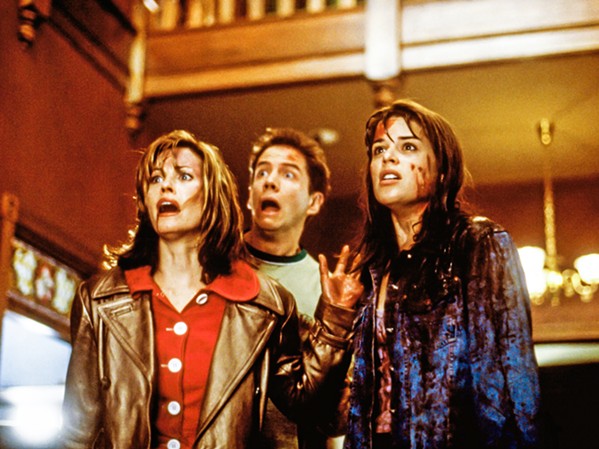 BLOODY GOOD! (Left to right) Journalist Gale Weathers (Courtney Cox) and high schoolers Randy Meeks (Jamie Kennedy) and Sidney (Neve Campbell) try to survive a serial killer, in horror auteur Wes Craven's brilliant reinvention of the slasher genre, Scream, screening Oct. 22 and 23 at the Palm Theatre in SLO. - PHOTO COURTESY OF DIMENSION FILMS AND WOODS ENTERTAINMENT