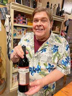 DIVINE WINE Grape Encounter Emporium owner Dave Wilson treats us to an amazing zinfandel by St. Hilair and regales us with tales. - PHOTOS BY GLEN AND ANNA STARKEY