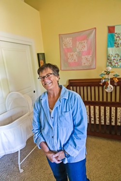 TIRELESS CARE After her three daughters moved out, Maggie plunged right back into raising children in 2018 when she opted to be a resource parent for foster infants. - PHOTO BY JAYSON MELLOM