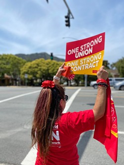 PROTESTING FOR CHANGE Sierra Vista nurses took to the street on April 27 to demand better staffing at Tenet Health hospitals. - PHOTO BY MALEA MARTIN