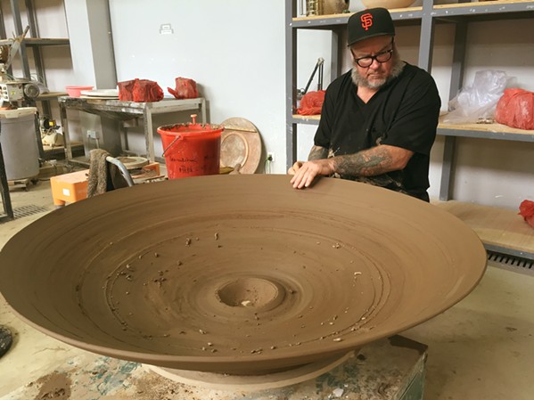 CREATING GIANTS The Place on PCH co-founder Darcy Badiali has a knack for making larger-than-life-sized plates, which you can find for sale at the Oceano art gallery. - PHOTO COURTESY OF THE PLACE ON PCH