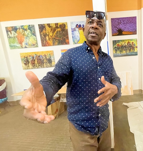 ANIMATED It’s impossible not to be caught up in artist and drummer Abbey Onikoyi’s unbridled enthusiasm for all things creative. He recently reopened his gallery Spirits of Africa in SLO’s Network Mall. - PHOTO BY GLEN STARKEY