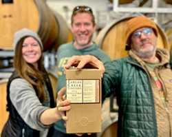 NEW DAY FOR ROS&Eacute; From left, Tablas Creek cellar assistant Amanda Weaver, proprietor Jason Haas, and winemaker Neil Collins have high hopes for the winery's 3-liter boxes. Haas estimates the new format reduces the carbon footprint of the same volume of wine in glass bottles by 84 percent. - PHOTO COURTESY OF TABLAS CREEK VINEYARD