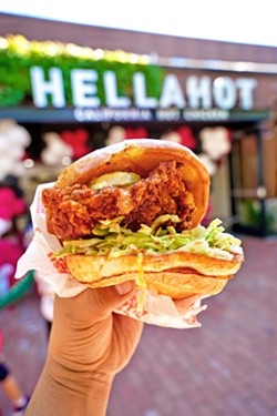 CROWING FOR MORE HellaHot's hot chicken sandwich comes with a breaded chicken breast lacquered with spicy oil and topped with pickles, cooling coleslaw, and lashings of their special sauce. - PHOTOS COURTESY OF HELLAHOT