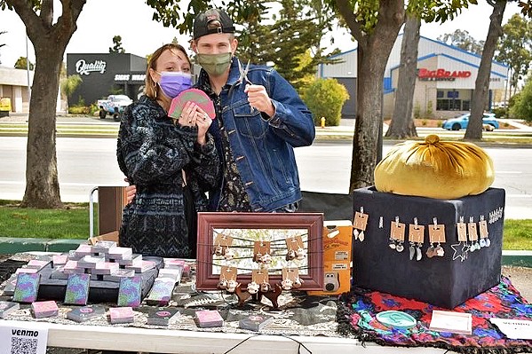 COUPLE CRAFTING Pablo Acosta (right) and Sadie Curdts (left) work together to handcraft their art and connect to the local San Luis Obispo community through craft fairs. - PHOTOS COURTESY OF CONOZCO CRAFTS