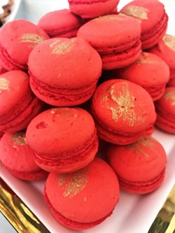 SPREAD LOVE Valentine's Day is Pardon My French Bakery's busiest time of the year, with baker Lalo Tejeda dishing out rose-, chocolate-, and strawberry-flavored treats like macarons. - FILE PHOTO BY HAYLEY THOMAS CAIN