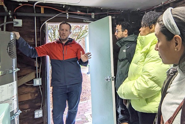 ADVACING EQUITY Eric Vieum, of the SLO Climate Coalition, gives a heat pump tour to Rita Casaverde of the Diversity Coalition, Courtney Haile of R.A.C.E. Matters, and Zach Rizk from BlocPower (right to left). The latter three organizations received a grant to work on ways to improve climate messaging equity. - PHOTO COURTESY OF THE SLO DIVERSITY COALITION