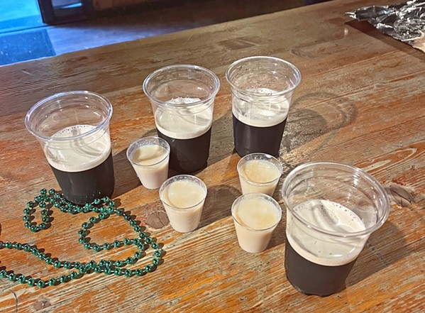 TILT AWAY Maneuver your glass of Guinness to empty out the shot glass of Jameson Irish Whiskey and Baileys Irish Cream before your Irish Car Bomb curdles. - COURTESY PHOTO BY NICHOLAS ZARATE