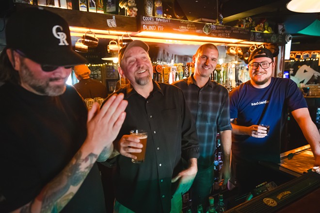 OF COURSE There has to be a reason McCarthy’s won Best Dive Bar. It could be the bar’s legacy, its dark corners, the shuffleboard, or the smoke-tinged patio, but it’s probably those bartenders, too: (left to right) Church, Robert Gaslight, Muscles, and Carson Spencer. - PHOTO BY JAYSON MELLOM