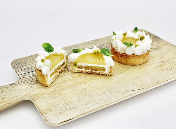 PEAR PERFECTION Chef Florencia Breda's Ricotta and Pear Tart will be available at Peruvian restaurant Mistura in SLO throughout May. The elaborate recipe combines pear sponge cake with ricotta mousse atop a hazelnut flour crust. - COURTESY PHOTO BY SHARON BREDA