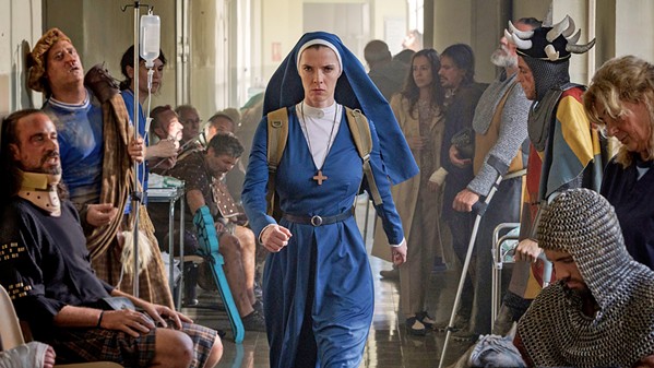 JESUS' WIFE Betty Gilpin stars as Sister Simone, a nun fighting an artificial intelligence, in the deeply weird sci-fi dramedy Mrs. Davis, streaming on Peacock. - COURTESY PHOTO BY SOPHIE KOHLER/PEACOCK