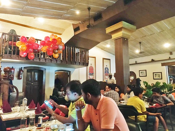 FULL HOUSE Bar-B-Q serves 400 customers at a time on average, according to its owner Rajiv Kothari, supposedly making it the largest restaurant in Calcutta. - COURTESY PHOTOS BY MOHAN RAJAGOPAL