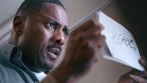 SKILL SET Idris Elba stars as corporate business negotiator Sam Nelson, who finds himself on a hijacked commercial flight and must use his talents to thwart the terrorists' plans, in Hijack, streaming on Apple TV Plus. - PHOTO COURTESY OF APPLE TV PLUS