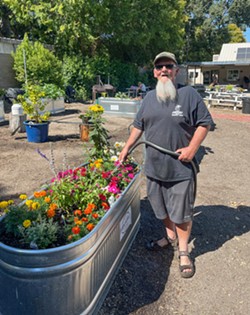 POWERFUL PURPOSE Thanks to the efforts of the El Camino Homeless Organization, former members of homeless encampments like Rick have found a new purpose and support in day-to-day community activities like gardening as they work toward finding permanent housing. - COVER PHOTO COURTESY OF EL CAMINO HOMELESS ORGANIZATION