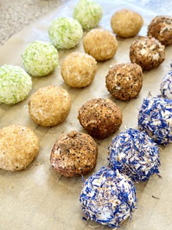 BEAUTIFUL BONBONS Among decadent product offerings at Black Market Cheese Co. are bonbons de fromage, including, from left, key lime pie, turbinado sugar and Asian five-spice, Moroccan spice, and dried pea flower and lemon zest. Prices are $12 per four-pack, with bulk pricing for special events. - PHOTO COURTESY OF BLACK MARKET CHEESE CO.