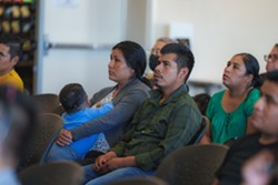 SPOTLIT More than 100 members of SLO County’s Mexican Indigenous community gathered at Cuesta College’s Paso Robles campus on Oct. 15 to view the preliminary findings of the Migrant Indigenous Community Survey. - COURTESY PHOTO BY STEPHEN HERALDO/HERALDO CREATIVE STUDIOS