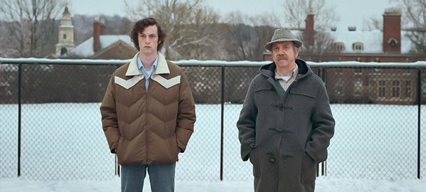 ALONE TOGETHER After his newly remarried mother informs him their holiday is canceled, boarding school student Angus Tully (Dominic Sessa, left) is forced to spend the Christmas with his history teacher, Mr. Hunham (Paul Giamatti), in The Holdovers, screening in local theaters. - PHOTO COURTESY OF FOCUS FEATURES
