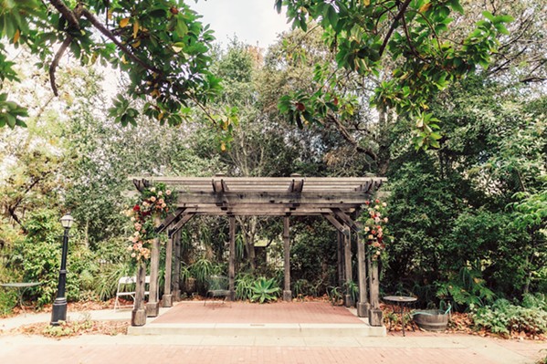 CEREMONY SPOT The Dallidet Adobe and Gardens, run by the History Center of San Luis Obispo County, offers a wooded spot for a wedding ceremony surrounded by beautiful flowers. - COURTESY PHOTOS BY BLAKE ANDREWS