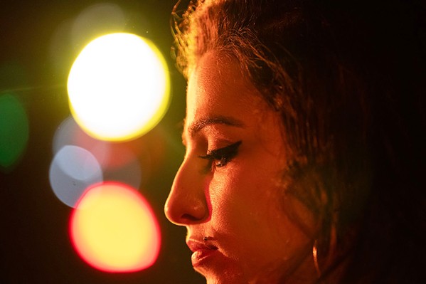 27 CLUB Screening in local theaters, the new biopic Back to Black explores the life and music of British singer Amy Winehouse (Marisa Abela), who died of alcohol poisoning at 27. - COURTESY PHOTO BY DEAN ROGERS/FOCUS FEATURES