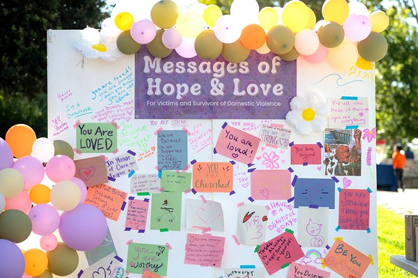 WORDS OF COMFORT Lumina Alliance’s Walk for Survivors event last October drew participants and well-wishers who left messages of encouragement for survivors of domestic violence. Lumina joined other local organizations to ask the state for more funds after federal cuts. - COURTESY PHOTO BY ANNA LILLIAN PHOTOGRAPHY