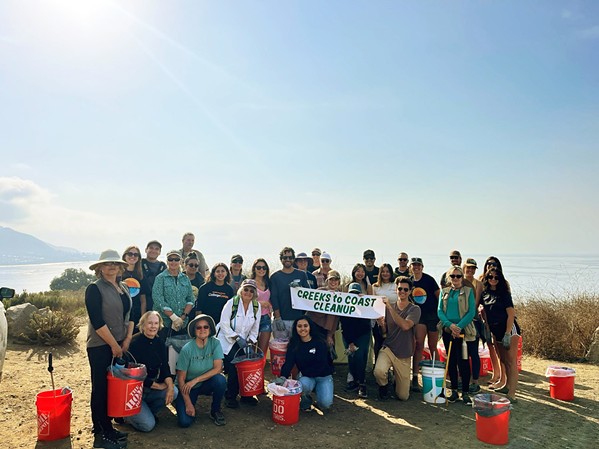 COASTAL CLEANUP On the annual International Coastal Cleanup Day, ECOSLO volunteers pick up trash to prevent it from being swept into the ocean in the fall. - PHOTO COURTESY OF ECOSLO