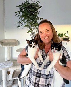 SEASONED CARE The Caffeinated Cat Caf&eacute; owner Jaime Pierce has a long history of fostering cats and can be seen here enjoying her time with her first pair of foster cats Lin and Reggie. - PHOTO COURTESY OF JAIME PIERCE