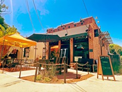 STAN'S ON BROAD Stan Kelly's Irie Ites Neighborhood Kitchen in San Luis Obispo operates out of a 1920s-era brick beauty encompassing less than 900 square feet, with seating for 12 indoors and another 22 on shaded front and side patios. - PHOTO BY CHERISH WHYTE