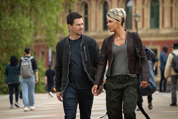 REUNITED AND IT FEELS OK High school sweethearts Mike McKenna (Mark Wahlberg) and Roxanne Hall (Halle Berry) team up to save the spy community, in The Union, streaming on Netflix. - PHOTO COURTESY OF NETFLIX