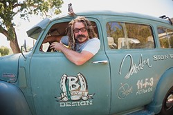 TWO HANDS, ONE BRUSH:  David Bond of Lucky B Design in Templeton is known for creating traditional hand-lettered signs for local breweries, restaurants, classic car and bike enthusiasts, and wineries. In recent years the big dogs&mdash;including Harley Davidson, Volcom, and Nike&mdash;have come knocking. - PHOTO BY KAORI FUNAHASHI