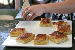 PUFF PASTRIES, CUBAN STYLE! :  Guests had a choice between savory tempeh and buffalo-stuffed or sweet fruit and cheese-filled pastries&mdash;Cuban specialties called pastelitos, which means little pies. - PHOTO BY GLEN STARKEY
