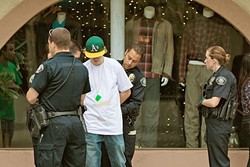 TOO MUCH FUN:  A reveler is taken into custody by the San Luis Obispo Police Department on the morning of St. Patrick&rsquo;s Day after allegedly throwing a water bottle. It was also his 21st birthday. Well-known party holidays like St. Patrick&rsquo;s Day, Halloween, and Mardi Gras see a heavy police presence in San Luis Obispo, which becomes a &ldquo;double fine zone&rdquo; during those times. - FILE PHOTO BY KAORI FUNAHASHI
