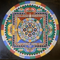 COLOR WHEEL:  For each mandala, the monks pour millions of grains of sand into a traditional pattern using a funnel tool called chak-pur. The process can take up to five days to complete. - PHOTO COURTESY OF ANET CARLIN