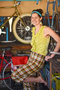 COMMUTER CHIC:  Organizer Kylie Mendonca shows off her handmade threads, which will be featured alongside some 45 designs crafted by local members of the community. - PHOTO COURTESY OF SLO BIKE COALITION
