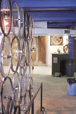 BIKELAND :  The gallery space on Osos Street is an intriguing meld of bikes, art, and fun. - PHOTO BY STEVE E. MILLER