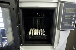 PRINTING PLASTIC :  This is an inside view of the new $35,000 prototyping machine used in Donald Rapoochi&rsquo;s manufacturing class. - PHOTO BY STEVE E. MILLER