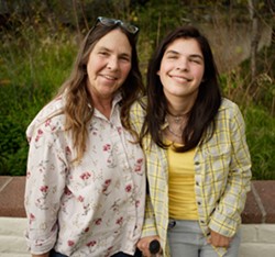 LOOKING UP :  Doctors thought Ivy Alvarado (right) would never even regain consciousness after her heart suddenly failed but now she&rsquo;s regaining motor skills, speech, and her sense of humor. Her mother Melinda Alvarado (left) faces staggering medical bills. - PHOTO BY STEVE E. MILLER