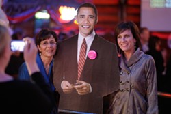 INAUGURAL BALL :  Simone Viola (right) and Pirtza Abuan (left) pose with President Obama's cutout at The Graduate. - PHOTO BY STEVE E. MILLER