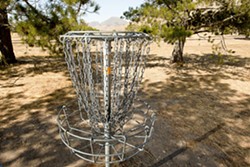 SLIP A DISC :  The SLO Throwers, a local disc-golf club, has been instrumental in setting up disc golf courses around San Luis Obispo County, including this one at Laguna Lake, - PHOTO BY STEVE E. MILLER