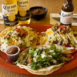 TRY &rsquo;EM :  The delicious tacos at Zorro&rsquo;s satisfy during happy hour. At $2 each, they pair well with a cold Corona and fresh chips and salsa. - PHOTO BY STEVE E. MILLER