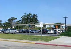 A SHINING EXAMPLE :  A project three years in the making would supply nine Coastal Unified campuses with up to 50 percent of their electric needs using solar carports like the one proposed for Baywood Elementary in Los Osos (artist rendering shown). - PHOTO ILLUSTRATION COURTESY OF FIRMA CONSULTANTS, INC.